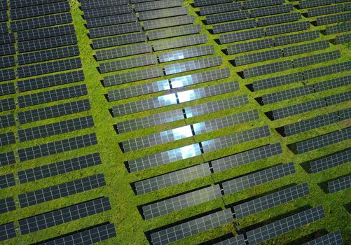 Solar energy power farm. Aerial view of solar panels. High quality photo