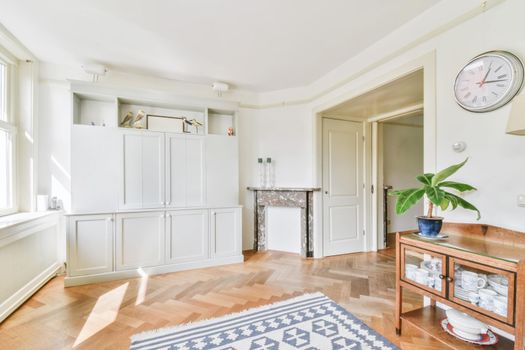 Lovely room with bookcase and artificial fireplace