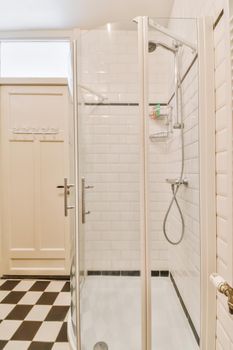 Delightful bathroom with white and black checkerboard floor