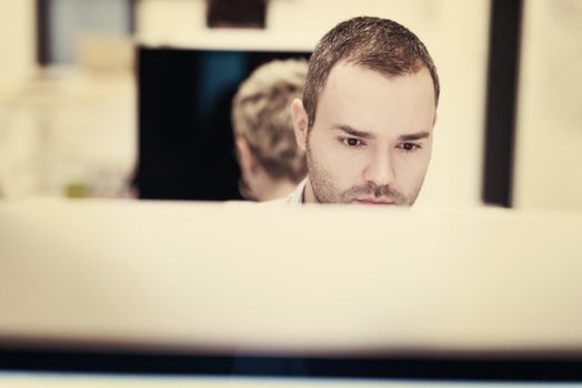 startup business, software developer working on desktop  computer at modern office