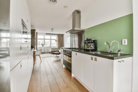 Stylish compact kitchen with a large solid gas stove