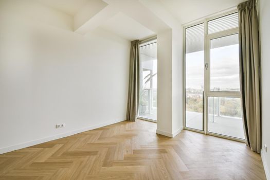 Mesmerizing room with floor-to-ceiling window with curtain