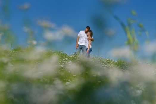 happy young couple in love have romance and fun at wheat field in summer