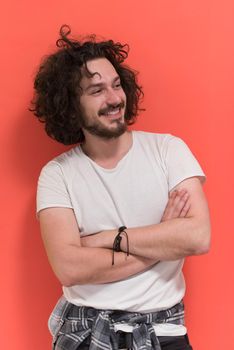 Portrait of a beautiful  young man with funny hair over color background with copyspace expressing different emotions