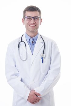 Coronavirus covid-19 pandemic Portrait of hero in white coat.  Cheerful smiling young doctor with stethoscope in medical hospital standing against white  background.