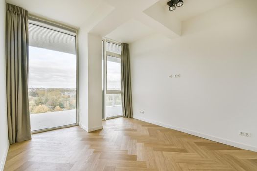 Mesmerizing room with floor-to-ceiling window with curtain