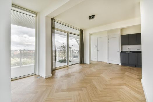 Mesmerizing room with floor-to-ceiling window with curtain