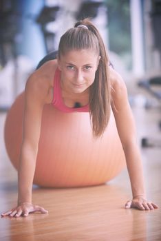 woman exercise pilates in fitness gym club