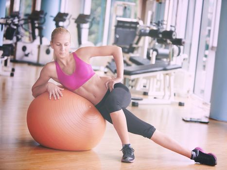 woman exercise pilates in fitness gym club