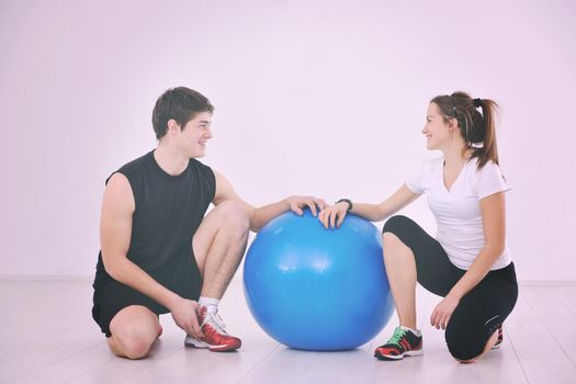 happy young people group in excercise and relax in  fitness club