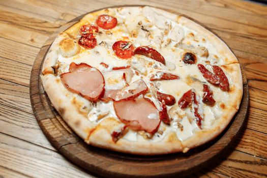 Pizza on wooden table top view. Fast food. Post blog social media. with copy space. Pizza ready to eat.