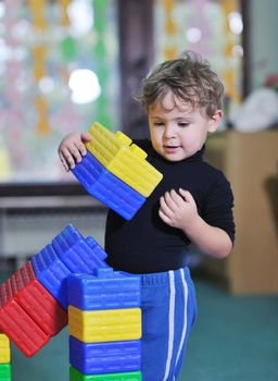 happy child kids group have fun and play at kindergarden indoor preschool education concept with  teacher