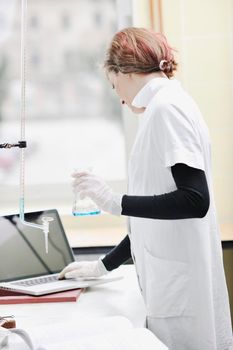 science chemistry classes with young student woman in labaratory