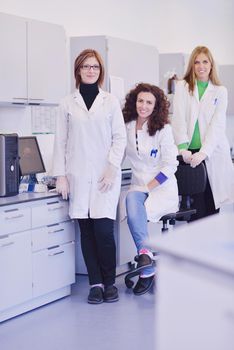 group of scientists working at the laboratory