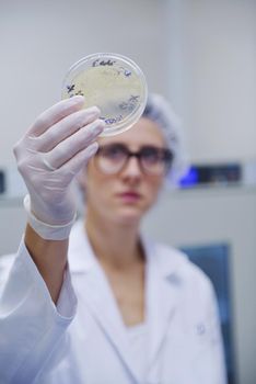 group of scientists working at the laboratory