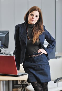 business woman in suit portrait in modern office