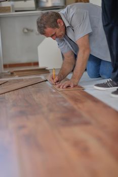 Installing laminate flooring in new home indoor