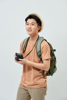 Full length portrait of happy tourist photographer man on white background. Travel blogger, tourist man.