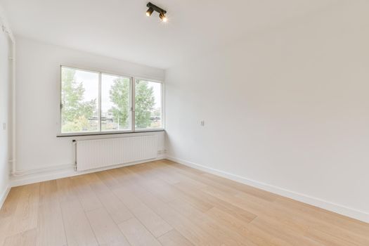 Spacious, bright and beautiful room with large windows and parquet floors