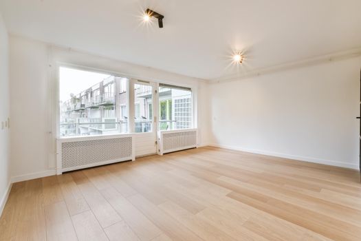 Spacious, bright and beautiful room with large windows and parquet floors