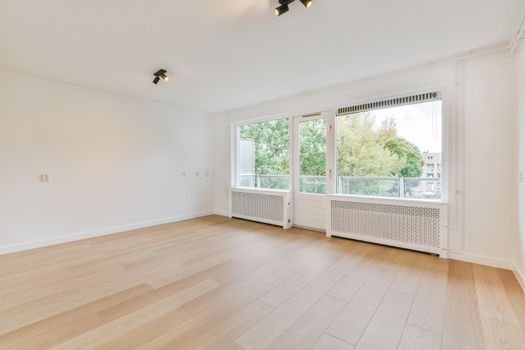 Spacious, bright and beautiful room with large windows and parquet floors