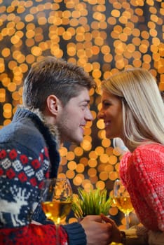 The young man gives a wedding ring   gift to  girl in restaurant