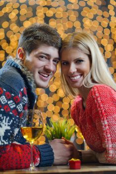 romantic evening date in restaurant  happy young couple with wine glass tea and cake