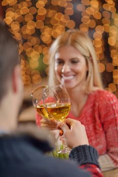 romantic evening date in restaurant  happy young couple with wine glass tea and cake