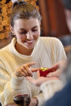 romantic evening date in restaurant  happy young couple with wine glass tea and cake