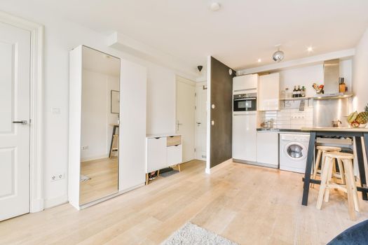 Attractive interior design of studio in luxury building