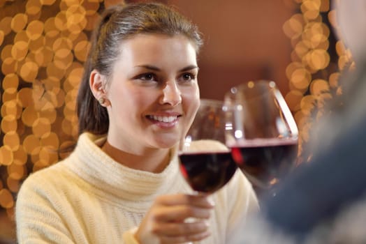 romantic evening date in restaurant  happy young couple with wine glass tea and cake