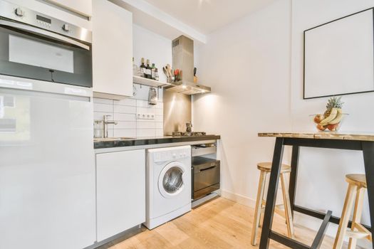 Cozy mini kitchen island in white tones