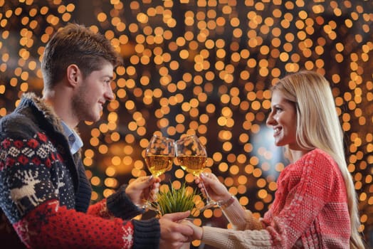 romantic evening date in restaurant  happy young couple with wine glass tea and cake