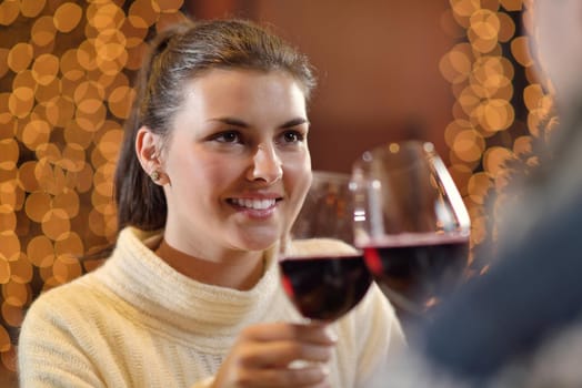 romantic evening date in restaurant  happy young couple with wine glass tea and cake