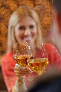 romantic evening date in restaurant  happy young couple with wine glass tea and cake