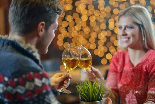 romantic evening date in restaurant  happy young couple with wine glass tea and cake