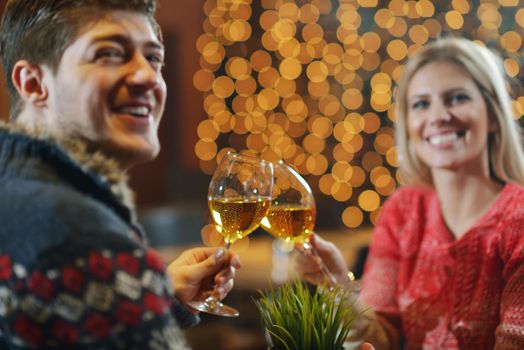 romantic evening date in restaurant  happy young couple with wine glass tea and cake