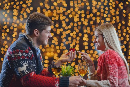 romantic evening date in restaurant  happy young couple with wine glass tea and cake