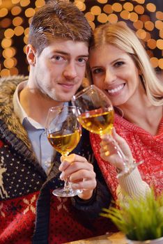 romantic evening date in restaurant  happy young couple with wine glass tea and cake