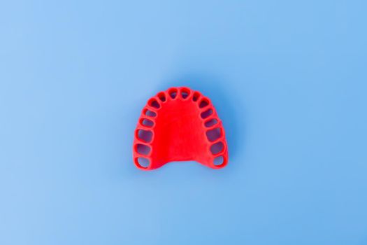 human gums without teeth model medical illustration isolated on blue background. Healthy teeth, dental care and orthodontic concept