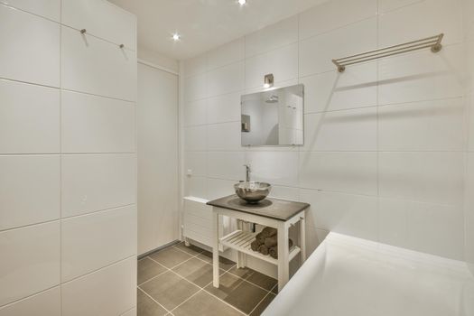 Bright elegant bathroom interior in a luxury house