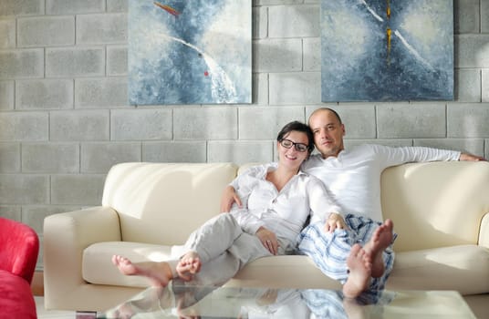 happy young couple relax at modern home living room indoor