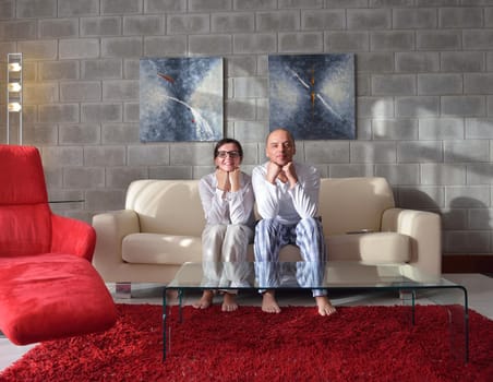 happy young couple relax at modern home living room indoor