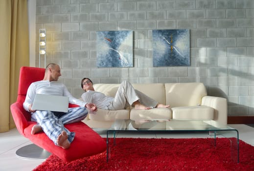 happy young couple relax at modern home living room indoor