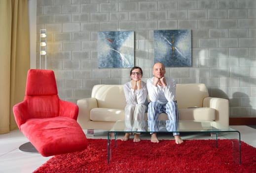 happy young couple relax at modern home living room indoor