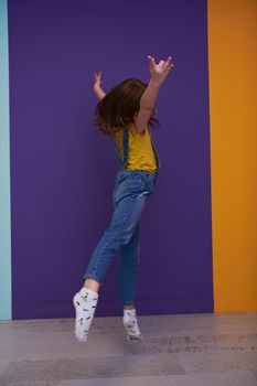 Cute little girl dancing ballet at home