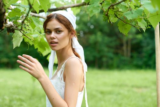 woman outdoors in garden countryside ecology nature. High quality photo