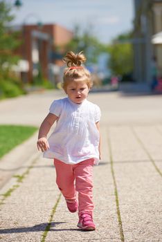 happy  little girl have fun in park