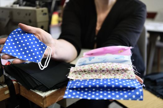 Homemade Manufacturing Of Protective Trendy Medical Face Mask. Tailor Woman Sewing With Machine At Home, Healthcare New Normal Concept In Coronavirus Covid19 Lockdown