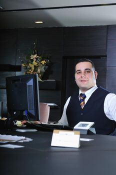 reception service man hotel indoor smile travel 